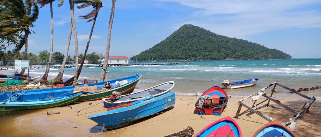 Colourful boats on the beach at M'Pai, Koh Rong Sanloem, Cambodia