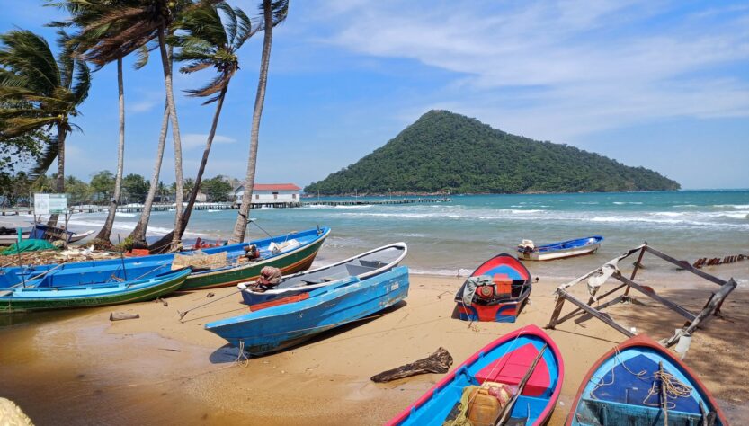 Colourful boats on the beach at M'Pai, Koh Rong Sanloem, Cambodia