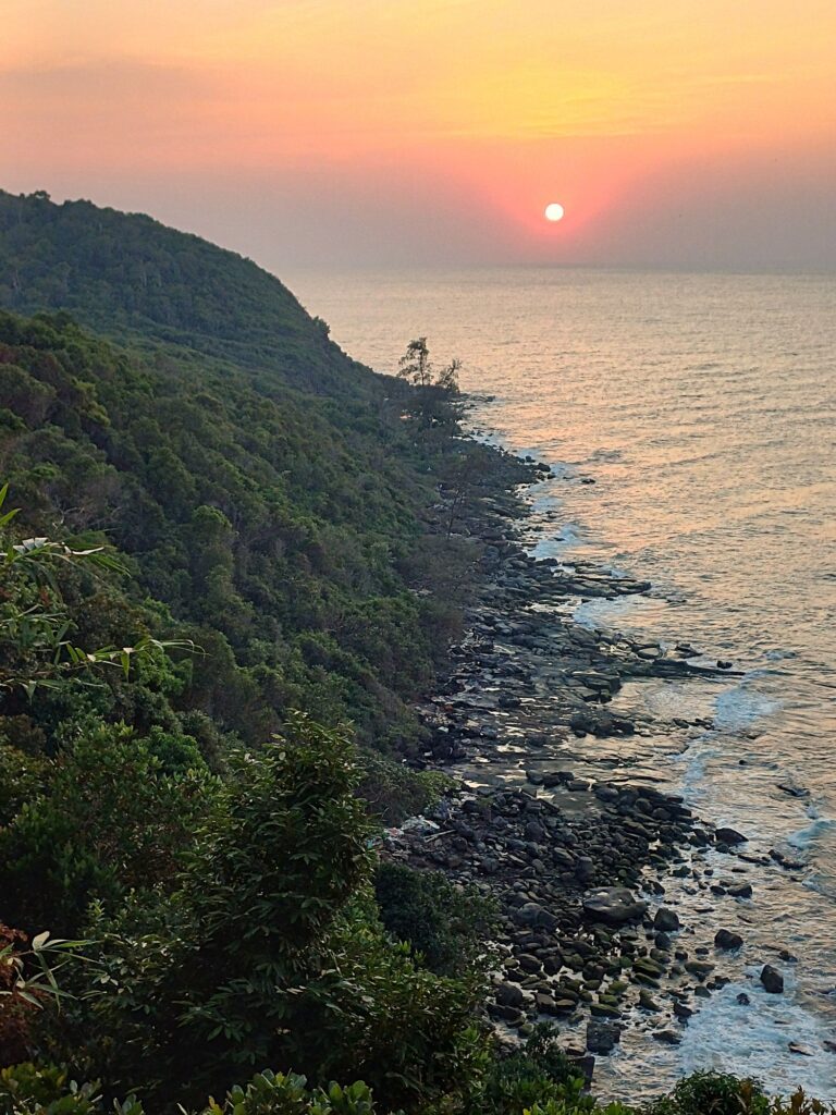 Sunset, seen from the cliffs above M'Pai Bay