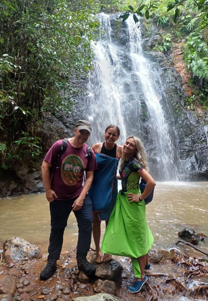 Exploring the lush heart of Flores...In front of a gushing waterfall. 