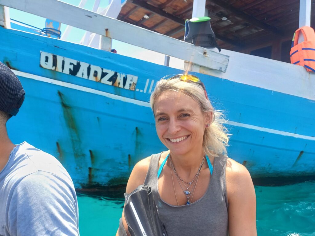Jagna in front of our Pinisi fishing boat, Komodo National Park.